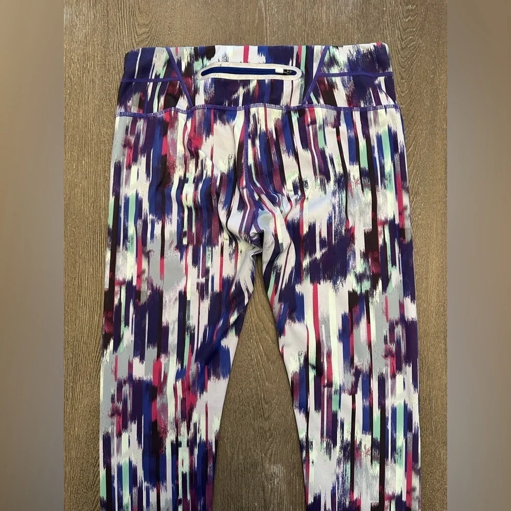LIKE NEW ATHLETA MULTI COLORED CROPPED LEGGINGS - Size Small AKU:1